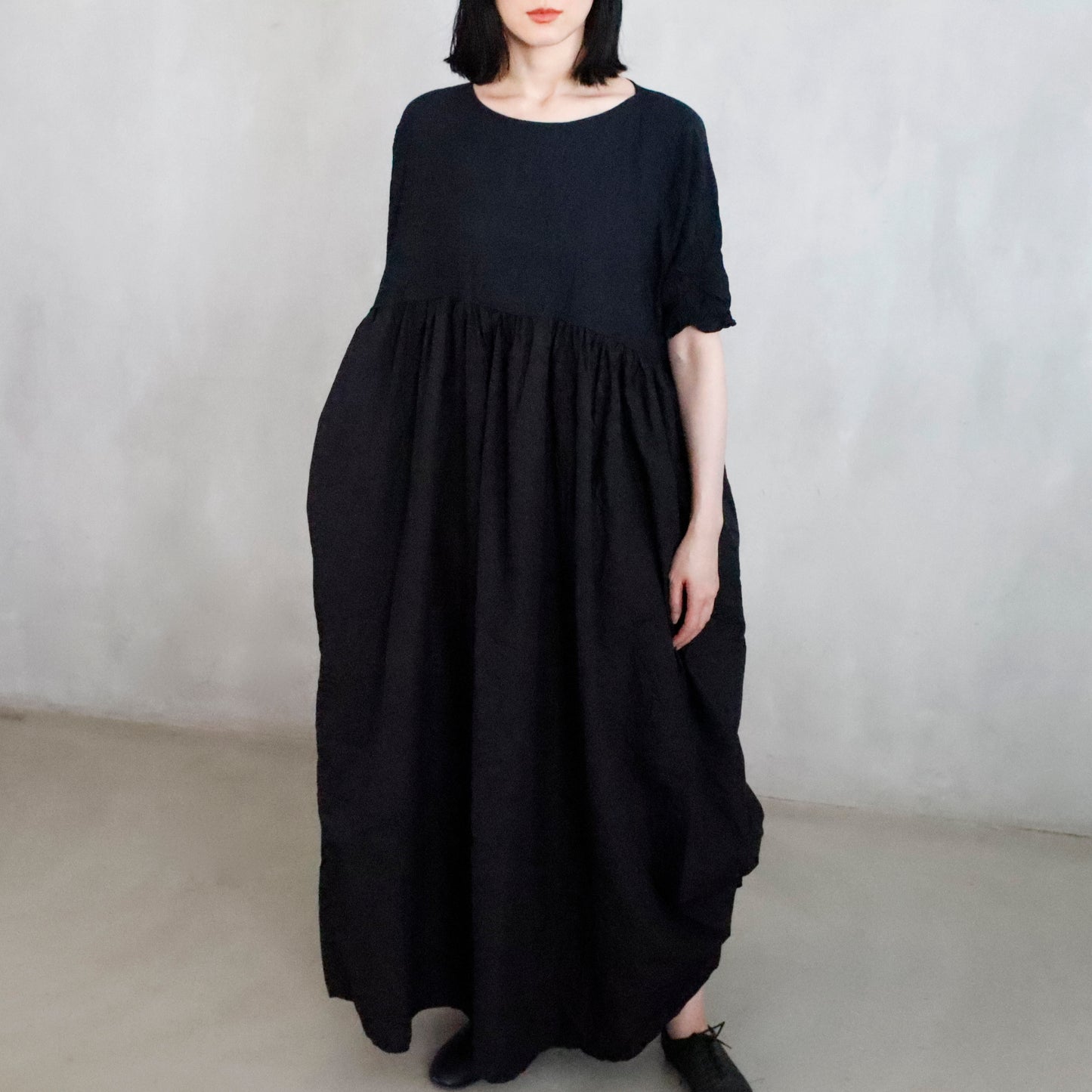 dress that has been washed and is stained - black