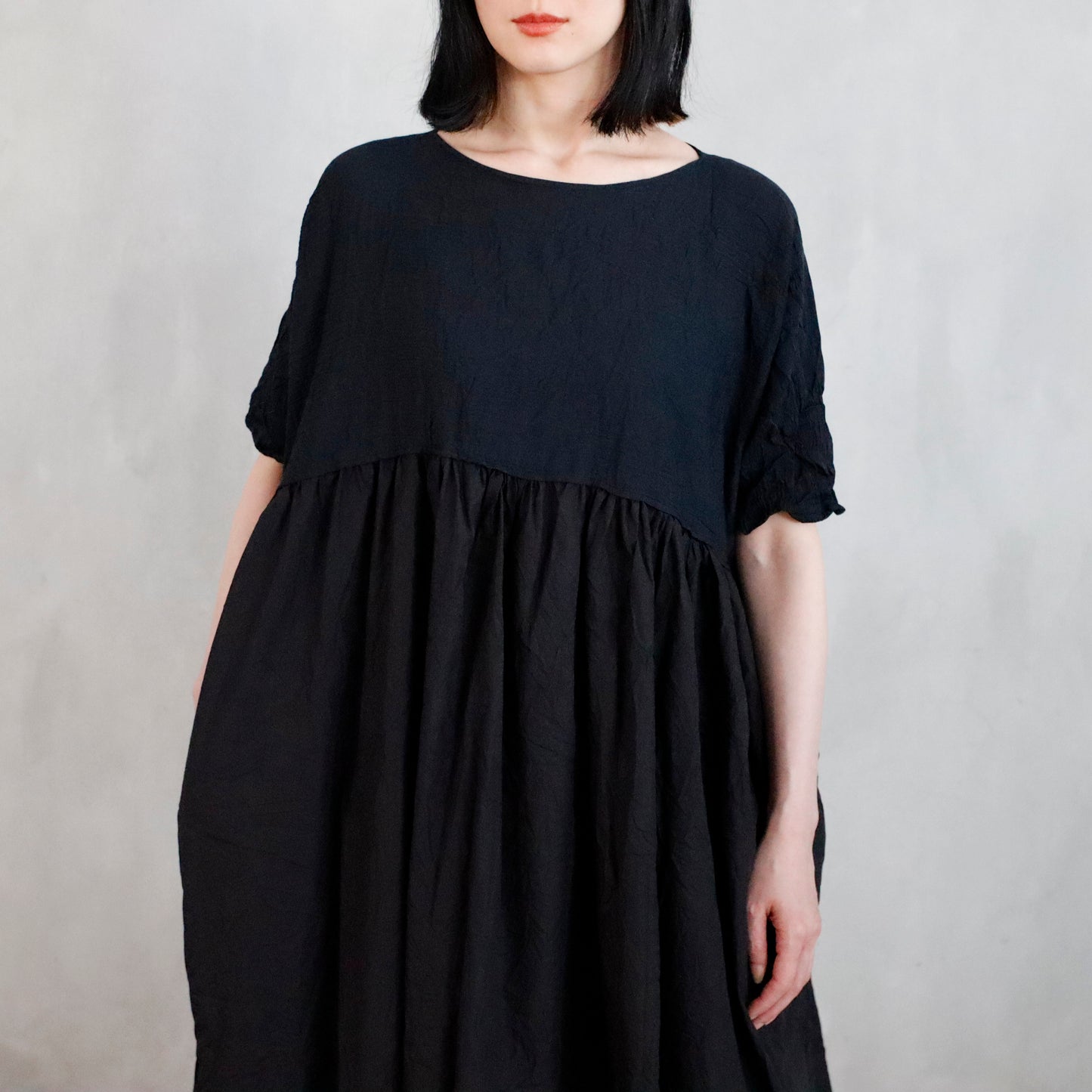 dress that has been washed and is stained - black