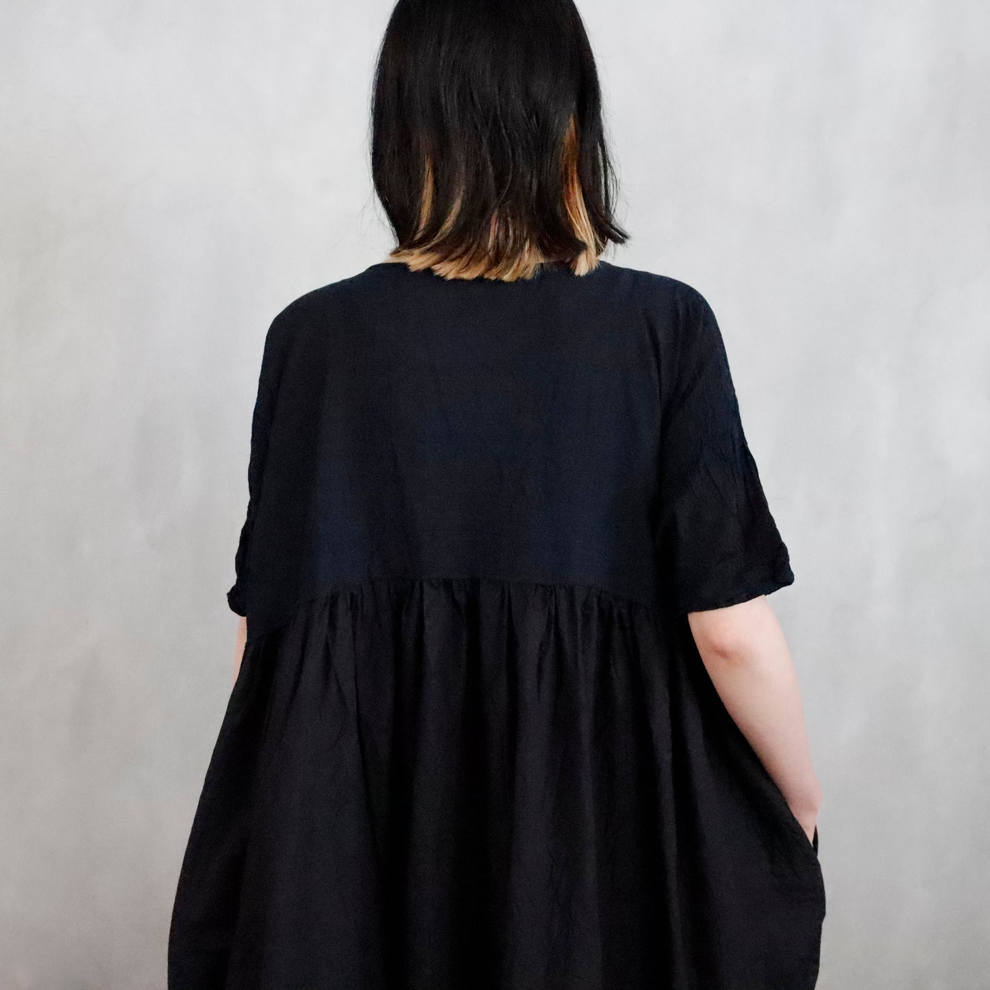 dress that has been washed and is stained - black